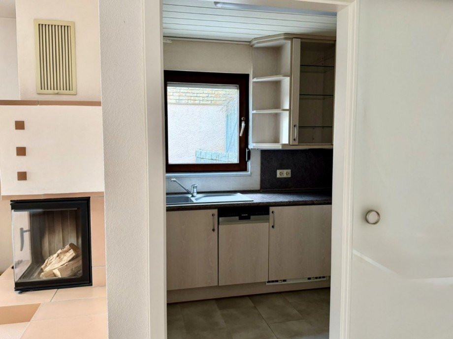 Kamin - Blick in die Küche Terrassenwohnung Herrenberg - Ehbühl