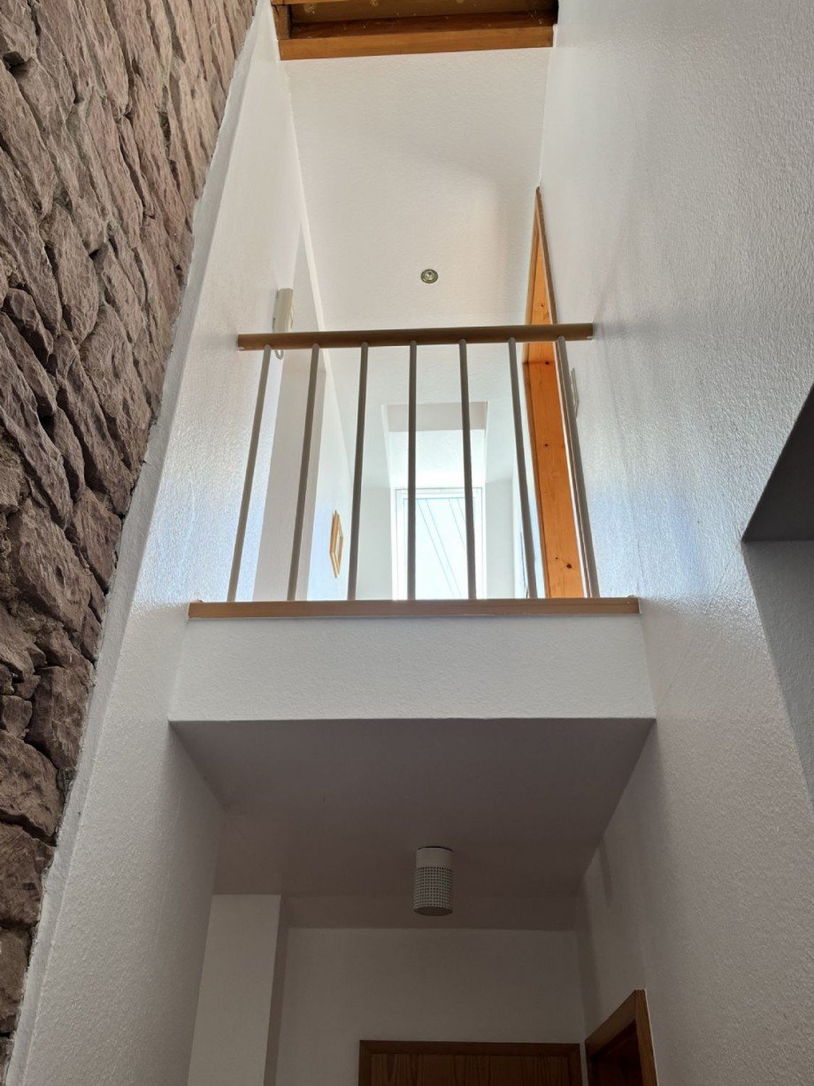 Verbindung zwischen Alt- und Neubau mit einem Stück original-Mauerwerk Einfamilienhaus Neuhausen